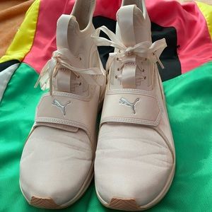 Puma high top sneakers in light pink.